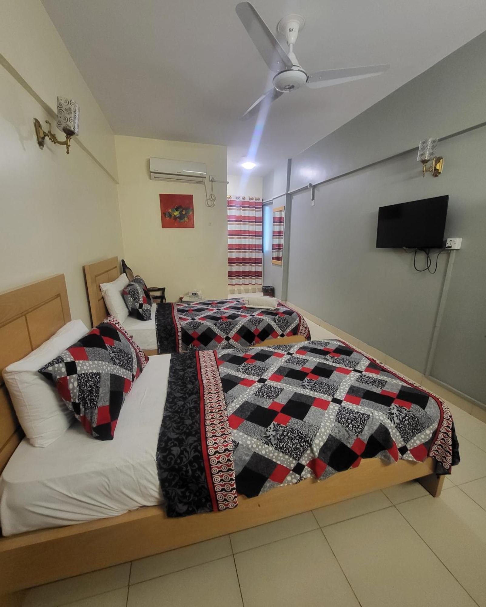 Hotel Rooms Dha Karachi Exterior photo
